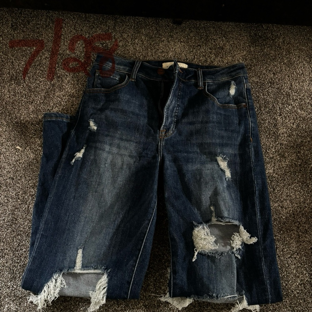 Distressed Blue Jeans